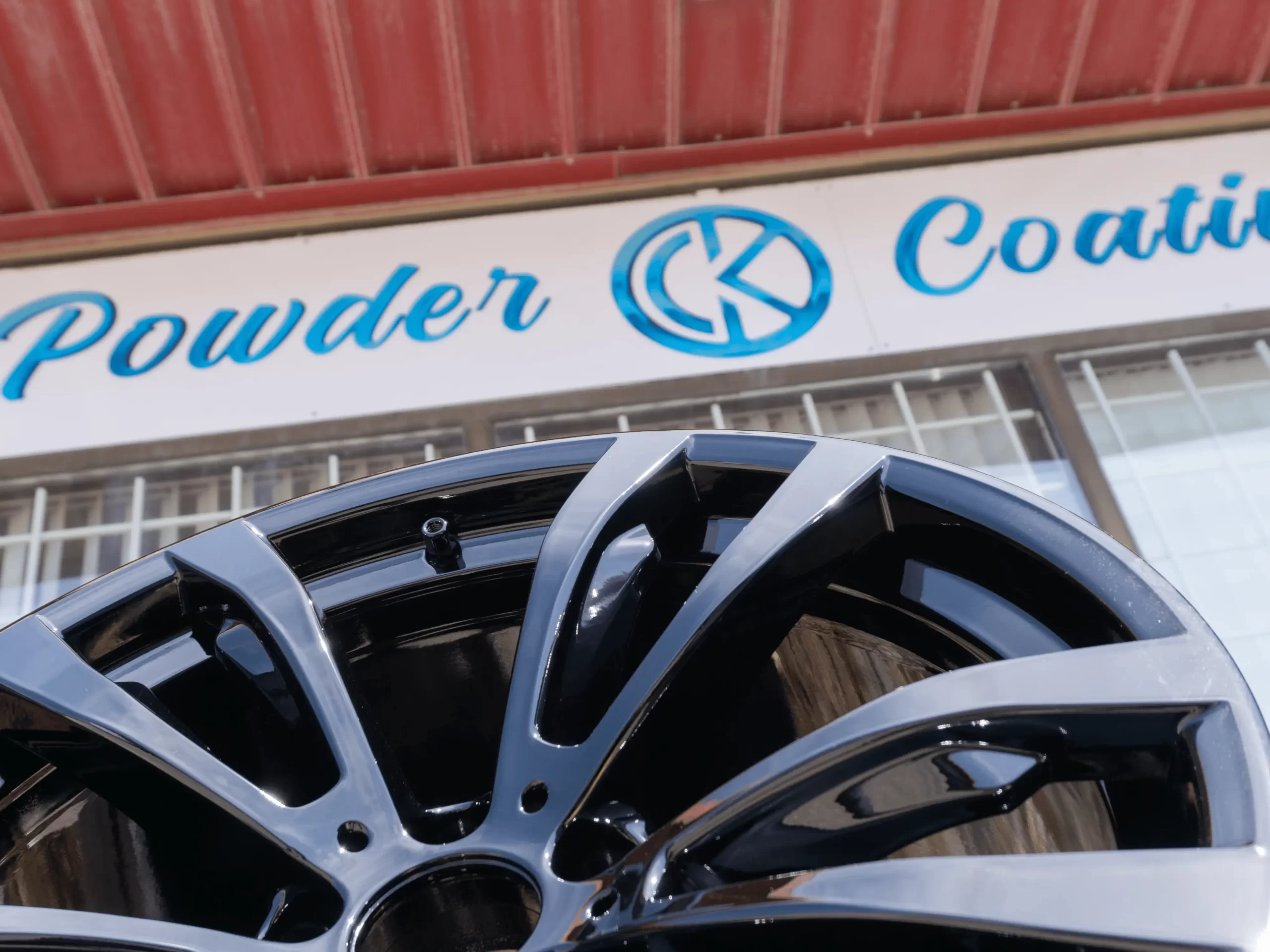 gloss black powder coated BMW wheel