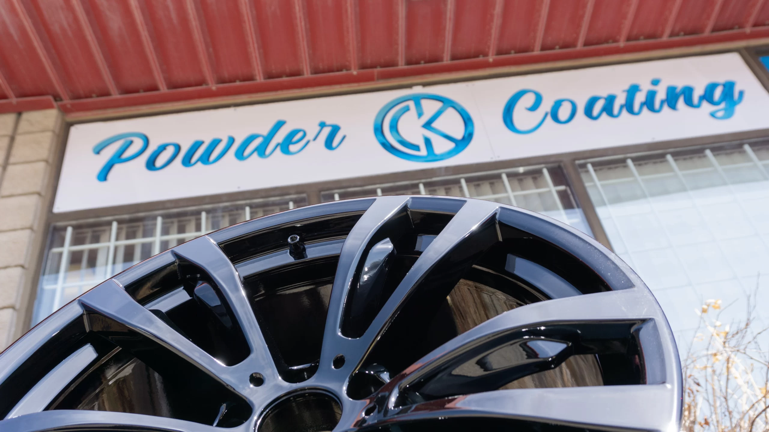 gloss black powder coated BMW wheel